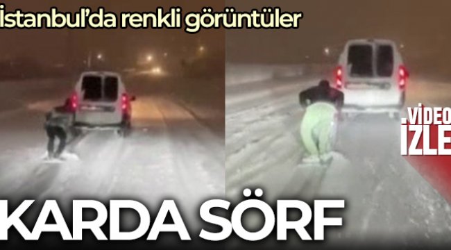 Karda aracın arkasına bağladığı tahtayla sörf yaptı