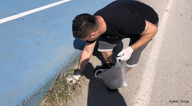 Hem spor yapıyor hem çevresini temizliyor