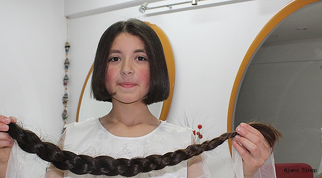  Küçük Zeynep beline uzanan saçlarını lösemili çocuklara bağışladı