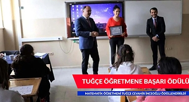 TUĞÇE ÖĞRETMENE BAŞARI ÖDÜLÜ